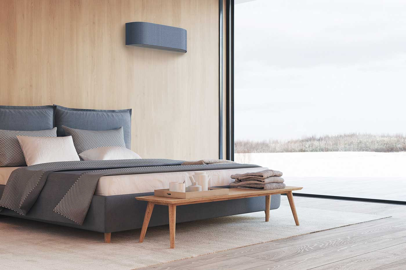 Toshiba Haori Klima-Innengerät mit Stoffbezug in einem ruhigen Schlafzimmer